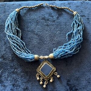 Boho glass beads and silver medallion necklace